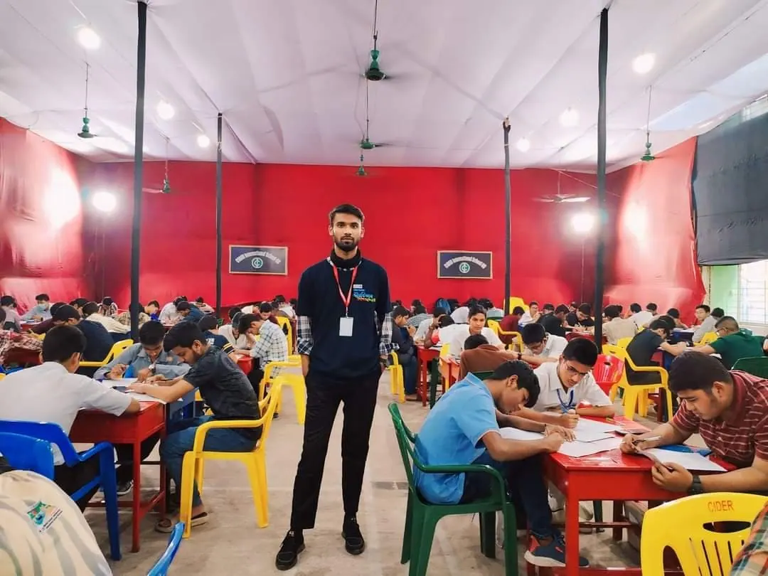 Invigilating the hall during a nationwide BioPC olympiad round.